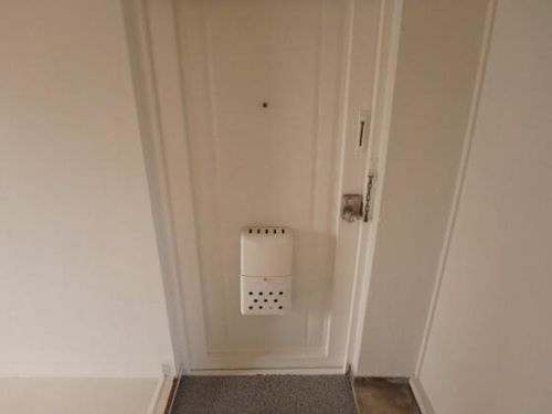 ヴィラナリー豊岡1号棟の玄関