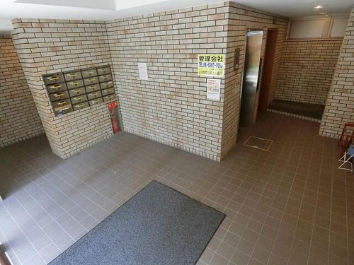 ルーエハイム千里丘の玄関