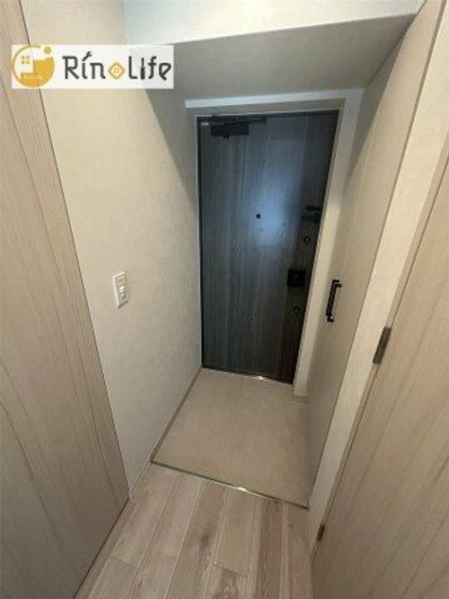 ファーストフィオーレ長田グランディールの玄関