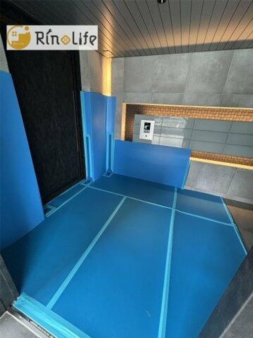 ファーストフィオーレ長田グランディールの玄関