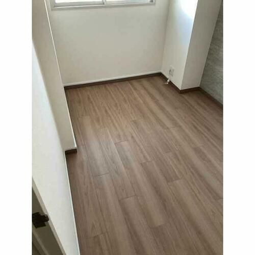コスモ北野田1309の居間