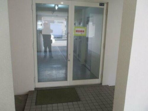 アーバンコート麻生Ⅱ103の玄関