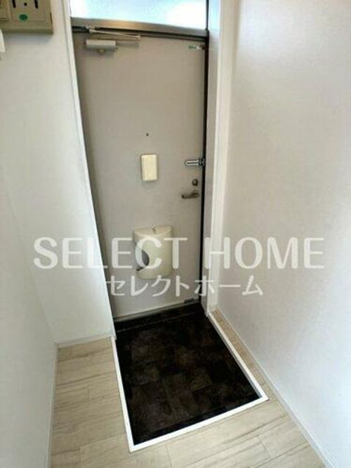 ベルメゾン鈴木101の玄関