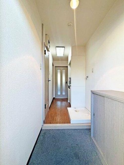 リヴェールチエ106の玄関