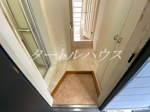 コスモ忍ヶ丘の玄関