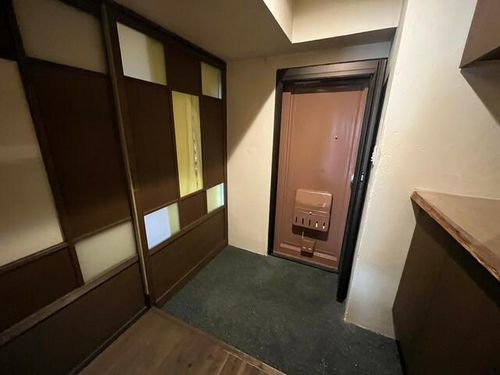 鎮西橋サンハイム202の玄関