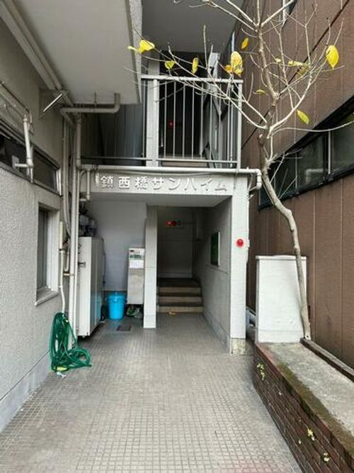 鎮西橋サンハイム202の玄関