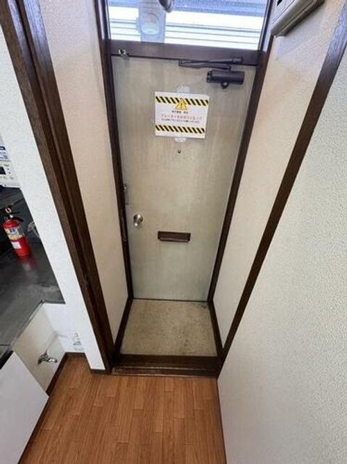 モンヴェール麻生 B棟0203の玄関