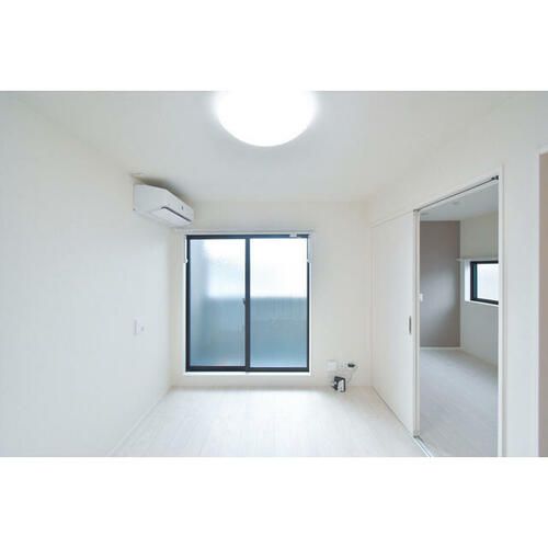 ハーモニーテラス淀下津町Ⅲ0201の居間