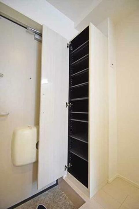 ハーモニーテラス梅林II201の玄関