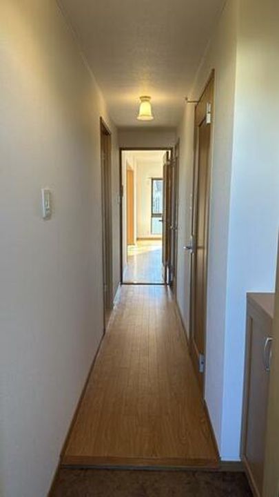 エルマーノ東小浜103の玄関