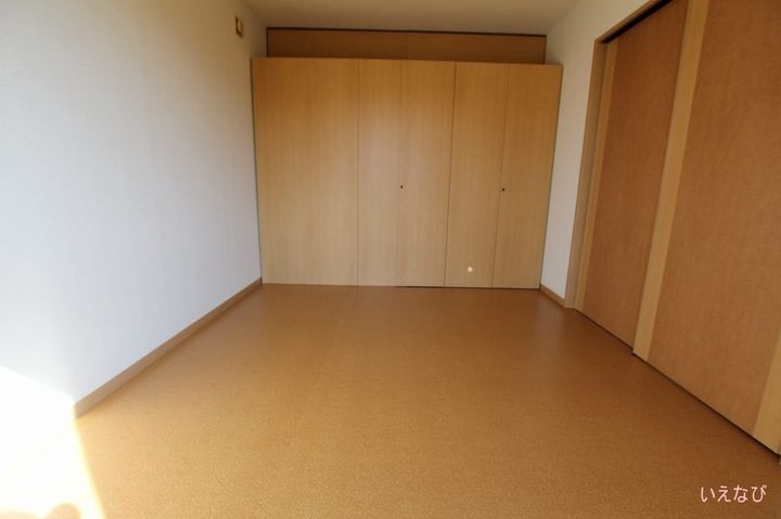 ヴィラージュ新涯A101の寝室