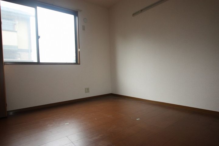 ハピネス山田 B101の寝室