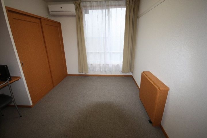 レオパレスHiro Ⅱ206の居間