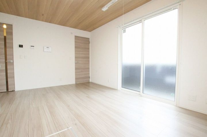 アパッショナート東浜201の居間