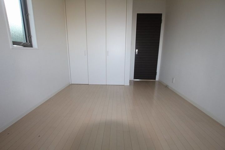 グランマスト多治米 C棟101の寝室