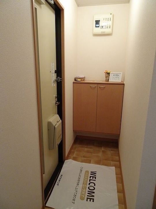 セジュール泉三嶽根201の玄関