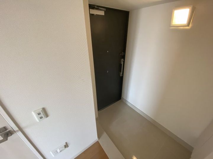 ジェイグラン新長田1201の玄関