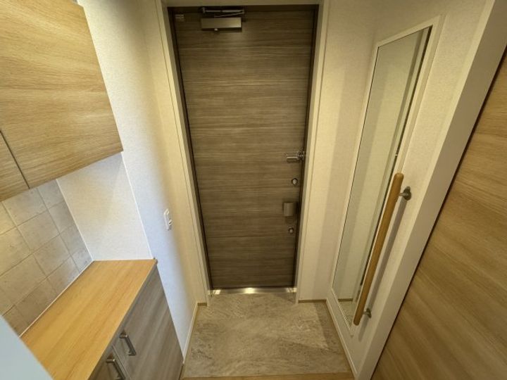 Avenir旭ヶ丘の玄関