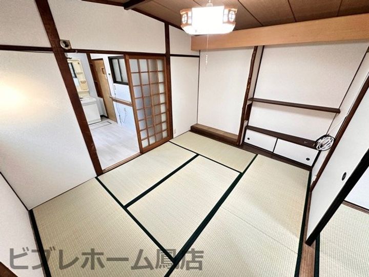 大阪府堺市西区鳳中町9丁(テラスハウス)の賃貸物件の居間