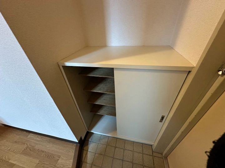 グリーンヴァリィ金光一番館0601の玄関