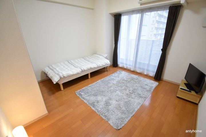 大阪府吹田市垂水町3丁目(マンション)の賃貸物件の居間