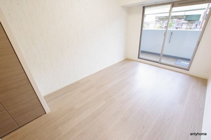 プレサンス OSAKA DOMECITY クロスティの寝室