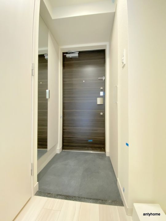 プレサンス福島吉野ミナージの玄関