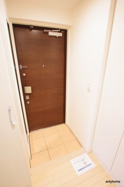 CITY SPIRE十三東の玄関