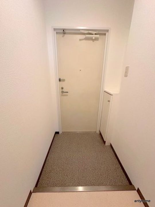 大阪府吹田市川園町(マンション)の賃貸物件の玄関