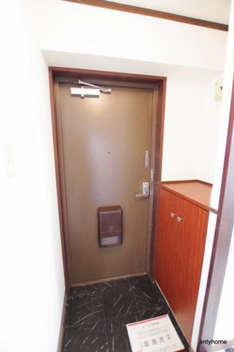 フローライト豊里1の玄関