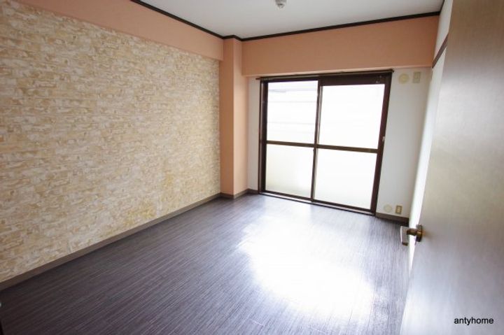 フローライト豊里1の寝室