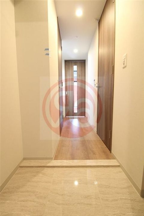 レジュールアッシュ天王寺舟橋の玄関