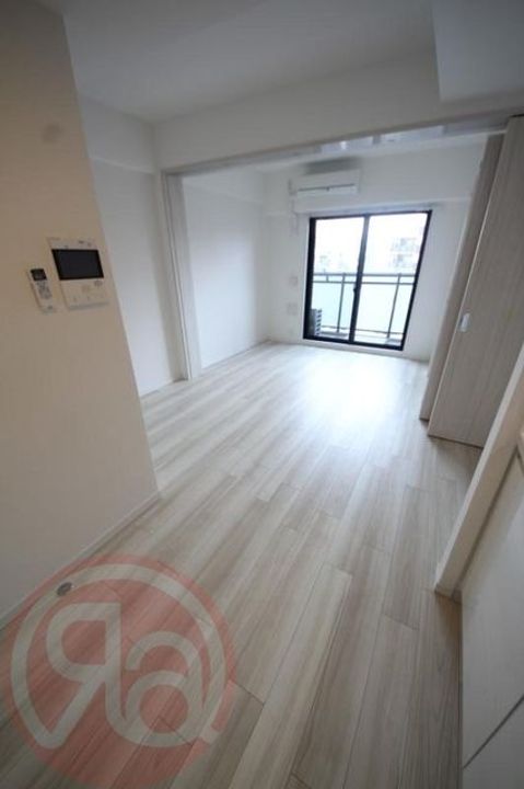 大阪府大阪市西区本田1丁目の賃貸マンション1310の居間