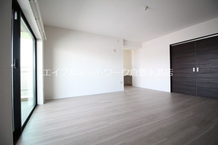 岡山県岡山市南区東畦(マンション)の賃貸物件1002の居間