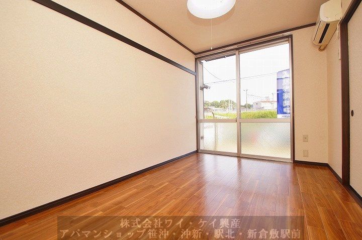 岡山県浅口郡里庄町大字新庄(アパート)の賃貸物件105の居間