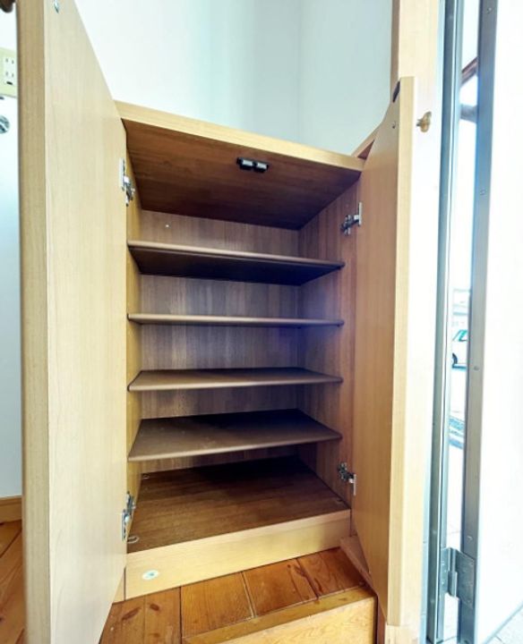 ウッディハウス林町202の玄関