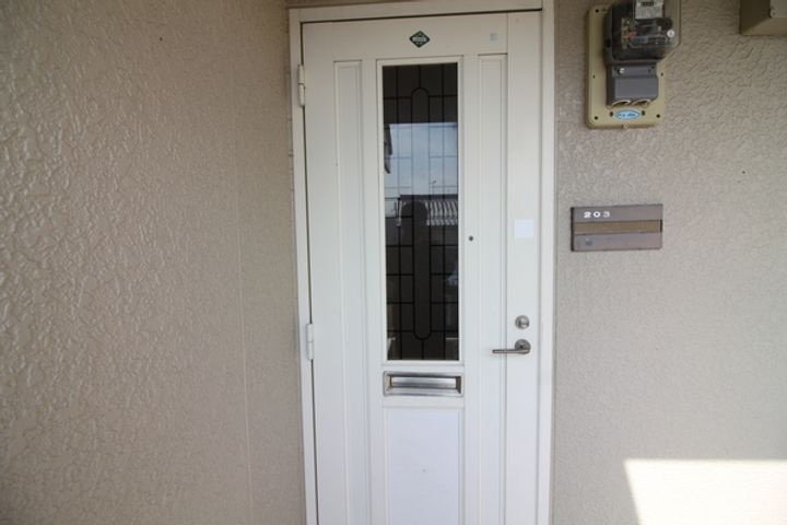 セジュール北新203の玄関