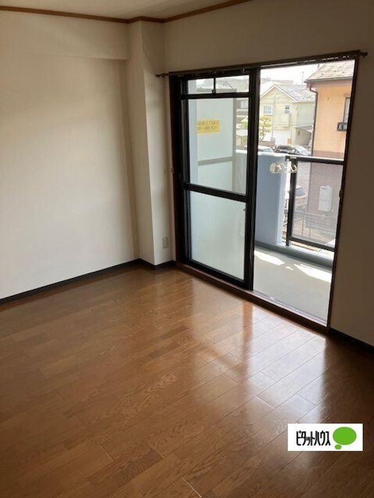 滋賀県野洲市市三宅の賃貸マンションの居間