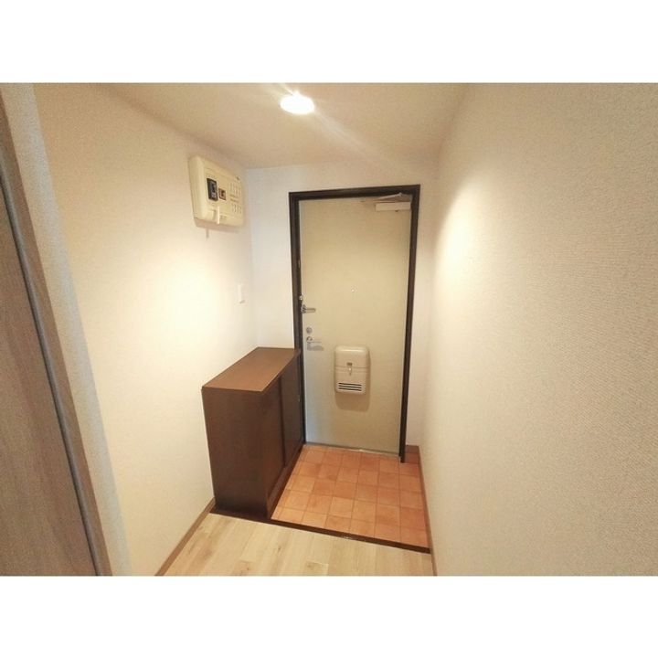 Limpiaベルフラワー藤森106の玄関