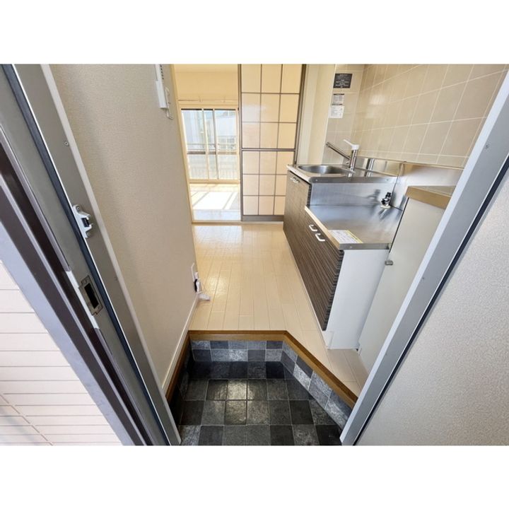 ベルメゾン南俣103の玄関