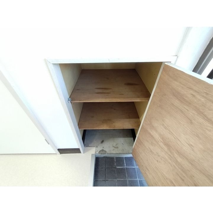 スウィートフレンド203の玄関