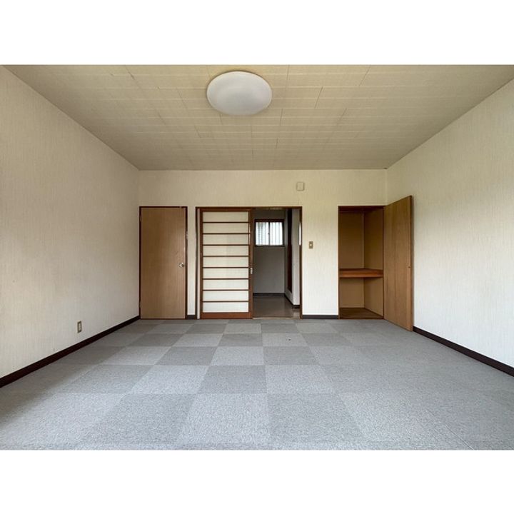 長野県佐久市原の賃貸アパートの居間