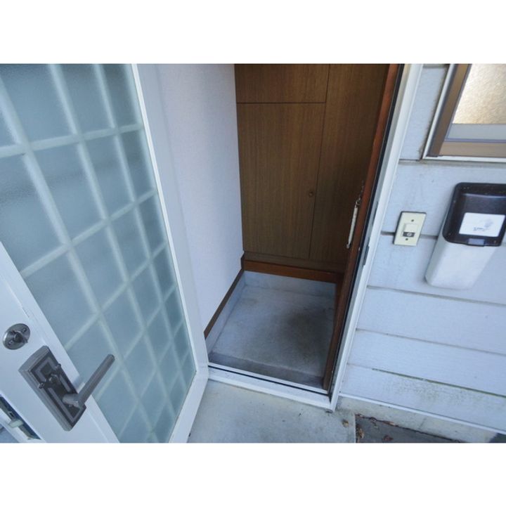 経塚ハイツ201の玄関