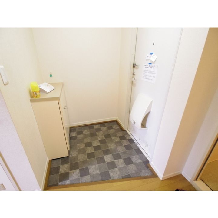 ベルメゾンK N棟205の玄関