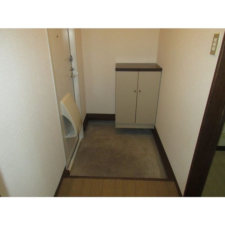 フレグランストゥギャザーA棟201の玄関