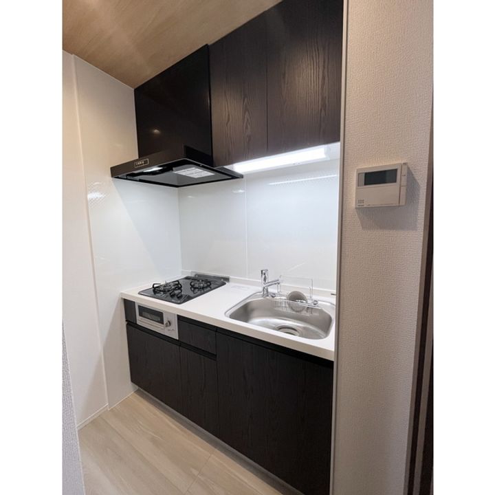 コラージュくりた203のキッチン