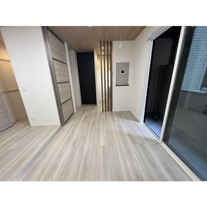 コラージュくりた203の居間