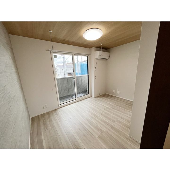 コラージュくりた207の居間