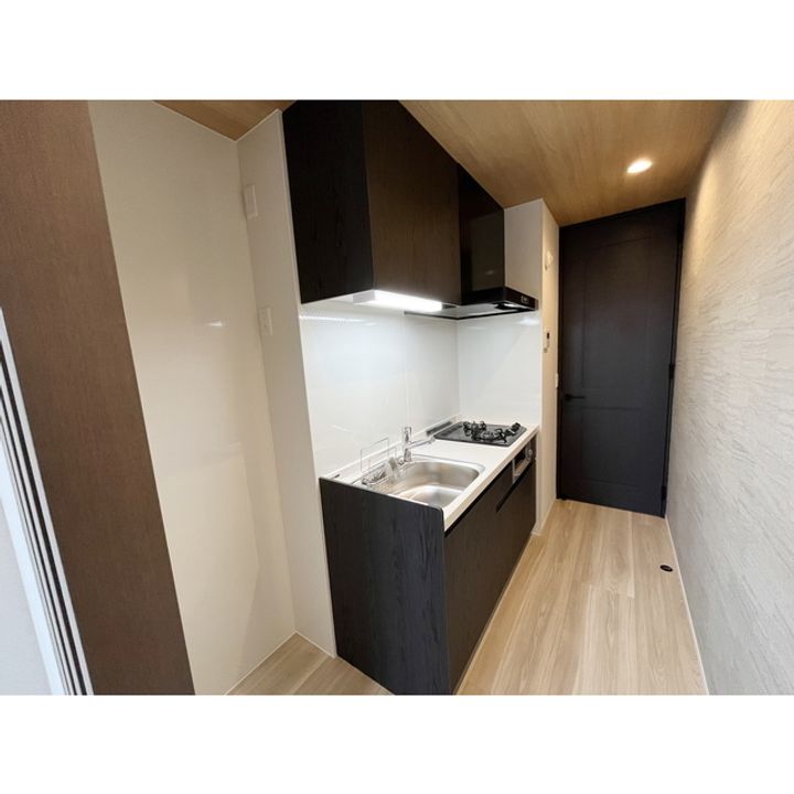 コラージュくりた207のキッチン